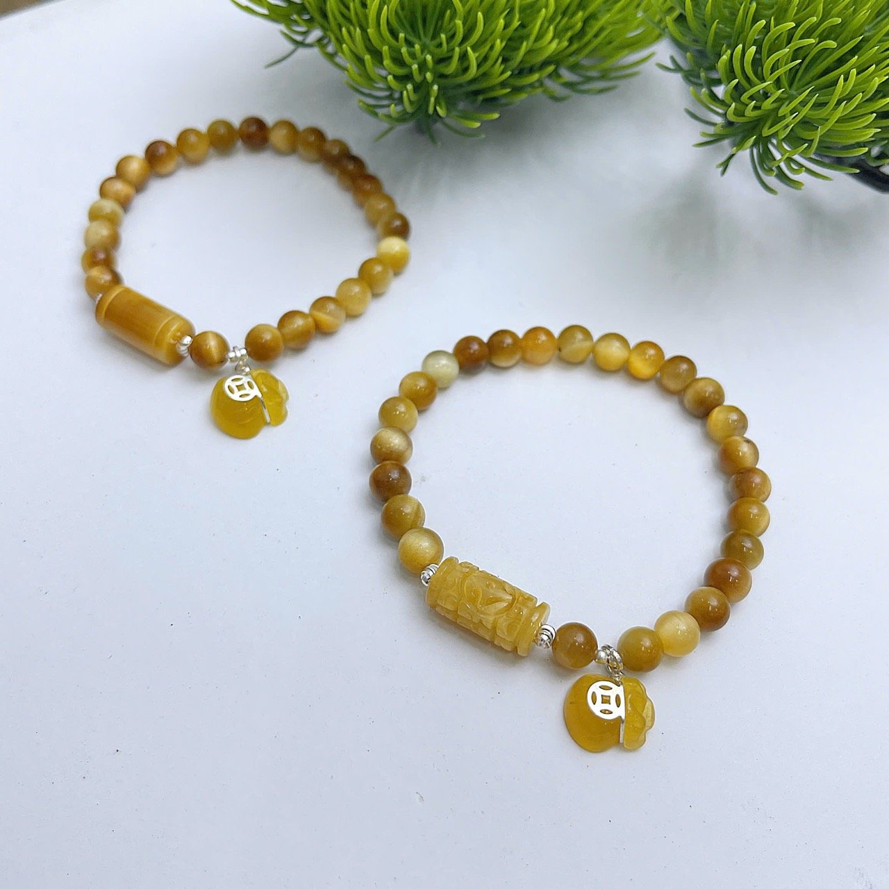 Vòng Tay Mắt Hổ Vàng Tâm Mix charm bạc + túi tiền Chiêu Tài, Hút Lộc